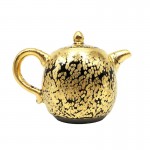 Gold oil drops to build a teapot