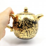 Gold oil drops to build a teapot